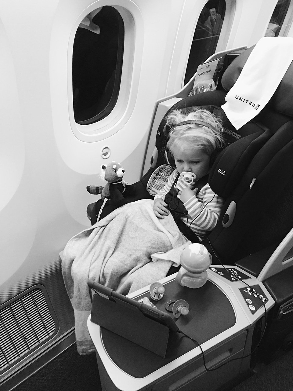 How to Travel Safely on a Plane With Kids This Summer